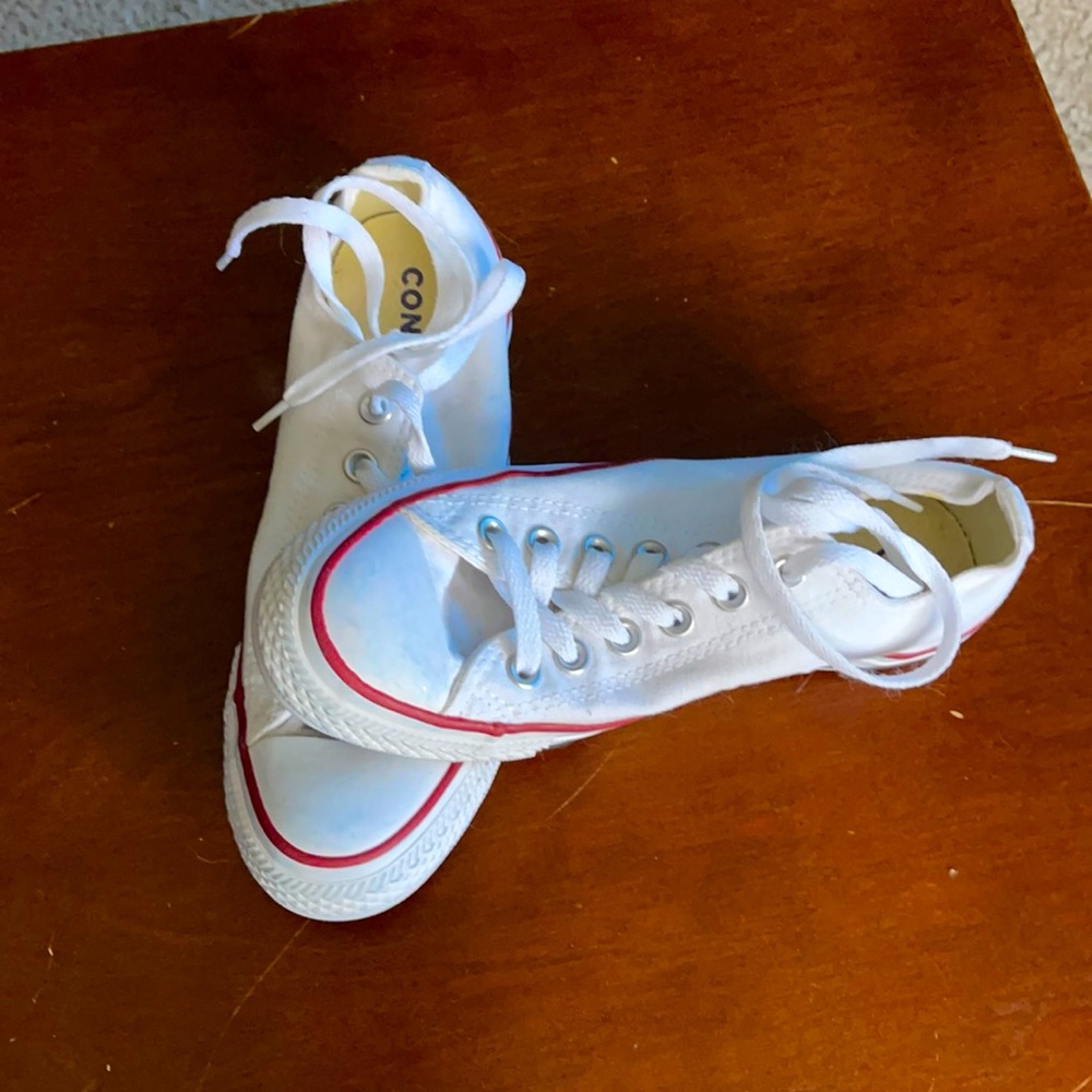 Converse Chuck Taylor All Stars worn indoors only.